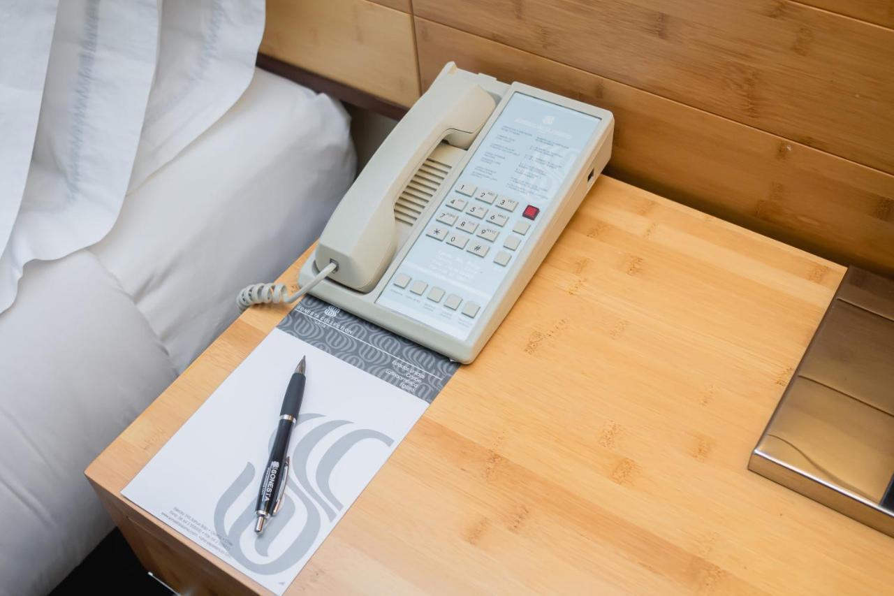 Sonesta Hotel Osorno Εξωτερικό φωτογραφία A telephone in a hotel room